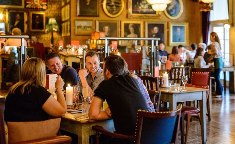 People dining at Cosy Club in Bath